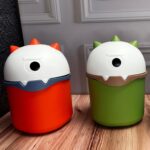 Caneca Dinosaurio Tapa Giratoria En La Cabeza 3 Colores 155X21Cm