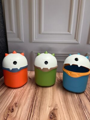 Caneca Dinosaurio Tapa Giratoria En La Cabeza 3 Colores 155X21Cm