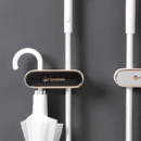 Organizador De Escobas Con Chupa Ultra Pegado Negro Con Dorado 145X45X7Cm